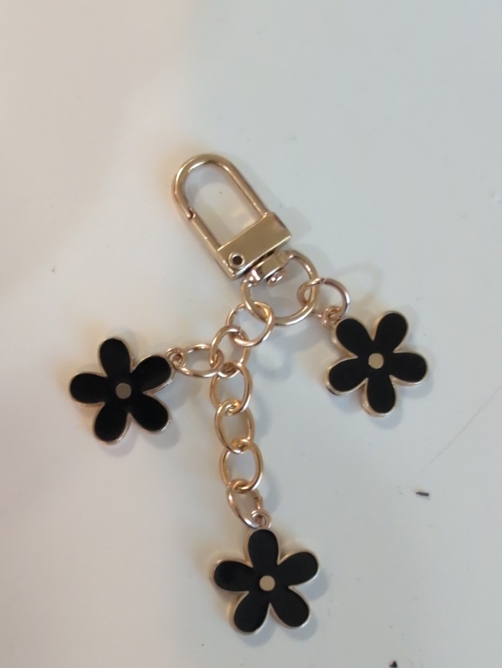 Gold Tone Keychain with Black Flower Charms